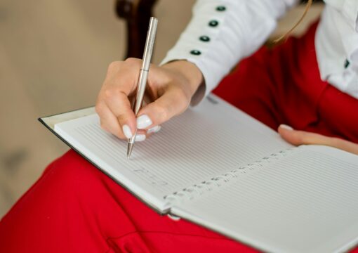 woman taking notes